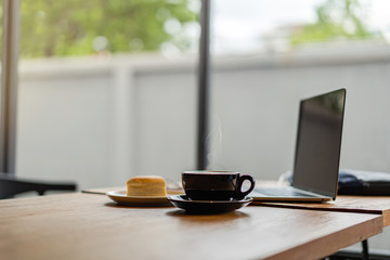 Coffee and cake on wooden table , nature background coffee cafe