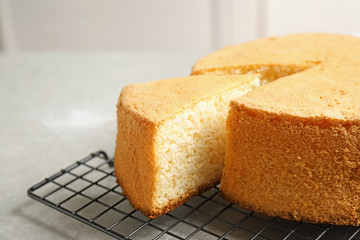 Delicious fresh homemade cake on grey table, closeup