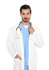 Fototapeta premium Young male doctor in uniform with stethoscope on white background. Medical service