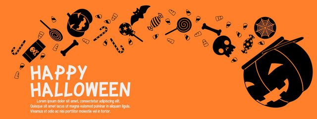 Composition of splashing Halloween candy on orange background