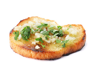 Slice of toasted bread with garlic and herb on white background