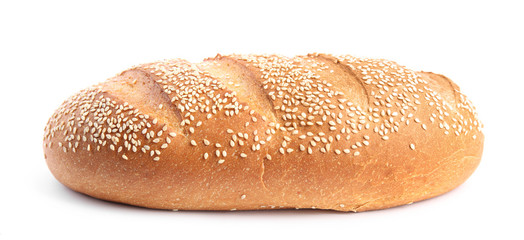 Loaf of fresh bread with sesame seeds on white background
