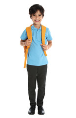 Happy boy in school uniform on white background