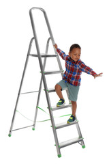 Little African-American boy climbing up ladder on white background. Danger at home © New Africa