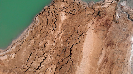 Obraz premium Sinkholes With water in dead sea aerial view 