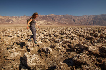 A hiker in Death Valley National Park, Geology, sand.