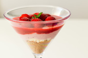 Strawberry parfait dessert served in coctail glass