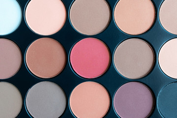 Beautiful eyeshadow palette pastel colors. Make-up. Beauty products. Tool for makeup artist. Decorative cosmetic. Brown eye shadow. flat lay. closeup.