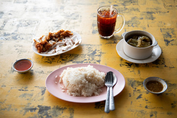 Fried chicken and Boiled chicken, Bitter soup with rice delicious breakfast prepared on the table to eat, Fast Food commonly eaten in the countries of Thailand  