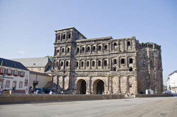 Naklejka premium TRIER,GERMANY-JULY 19,2014: View on Porta Nidra-Antique roman city gate in Trier,Germany on 19 July 2014.It is designated as part of the roman monuments, in Trier Unesco world heritage site.
