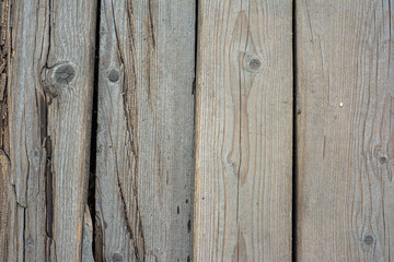 Background from carelessly laid wooden boards with large slots