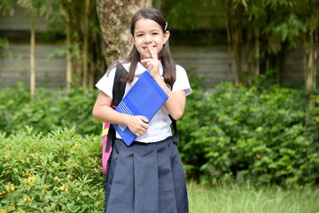 Bashful Filipina Girl Student With Books
