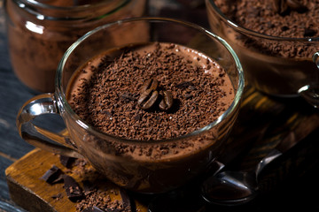 sweet chocolate mousse in glass cups