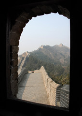 The Great Wall of China. This section of the Great Wall is Jinshanling, a wild part with scenic views. The Great Wall of China near Beijing. Wild Great Wall of China, Jinshanling, Beijing, window view