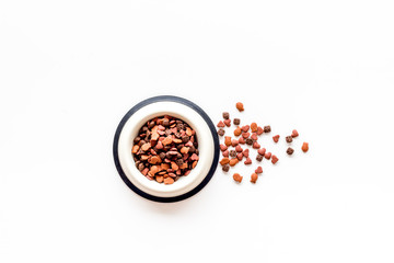 Puppy dry food on white background top view mockup