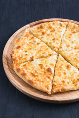 Megrelian Khachapuri Made From a Delicious Tender Dough with Melted Burnt Imeretian Cheese and Butter Close Up