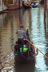 Obraz premium gandolas at venice canals summer time