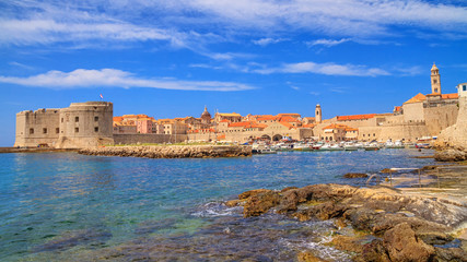 Fototapeta na wymiar Coastal summer landscape - view of the City Harbour and marina of the Old Town of Dubrovnik on the Adriatic coast of Croatia