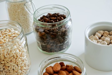 Various cereals, coffee, nuts, bran in glass jars. Zero waste concept, free plastic.