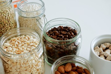 Various cereals, coffee, nuts, bran in glass jars. Zero waste concept, free plastic.