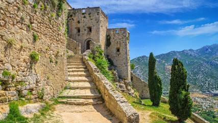 Summer mediterranean landscape - view of the stairs in the Klis Fortress, near Split on the...