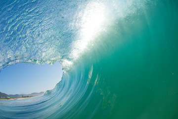 Inside out view of a wave breaking at Campeche beach in Florianópolis Brazil