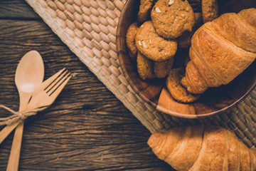 Fototapeta na wymiar home made bread croissant on wooden table