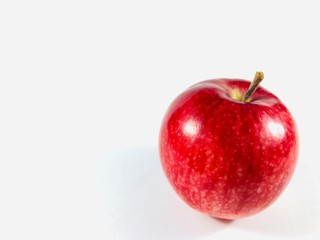 red ripe apple on white background