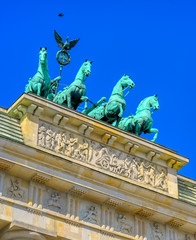 Naklejka premium The Brandenburg Gate located in Pariser Platz in the city of Berlin, Germany.