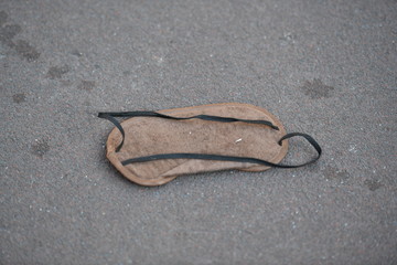 A forgotten sandal on a street in Osaka-Japan.
