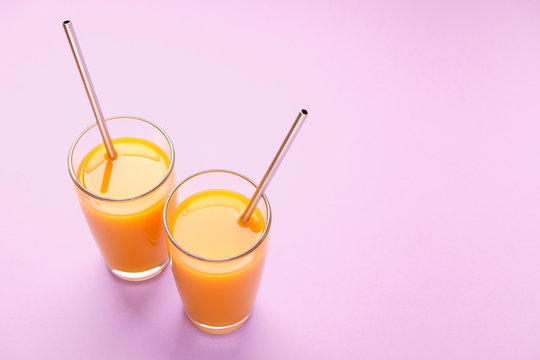 Two Orange Juice Glass with Metallic Steel Tubes
