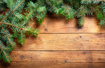 Christmas background. Christmas decoration with fir branches on wooden background