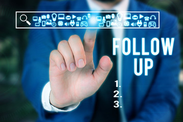 Word writing text Follow Up. Business photo showcasing a continuation of something that has already been started Male human wear formal work suit presenting presentation using smart device