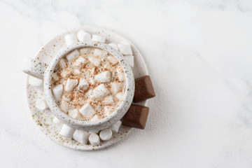 Fototapeta na wymiar Hot chocolate with marshmallow. Flat lay
