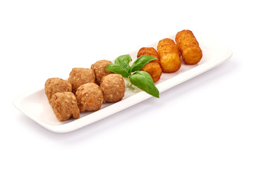 Potato croquettes and meat balls, isolated on white background