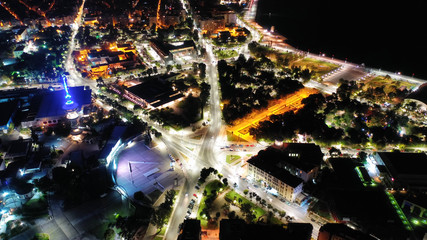 Aerial drone night shot of famous promenade area in new waterfront of Thessaloniki or Salonica featuring Alexander the Great statue, North Greece