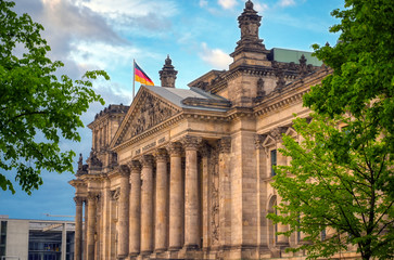 Fototapeta na wymiar The Reichstag building located in Berlin, Germany which houses the German parliament, the Bundestag.