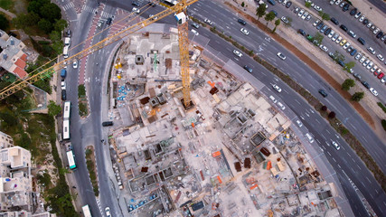 Obraz premium Jerusalem traffic landscape and construction site Aerial view Flying over Jerusalem traffic landscape and construction site 