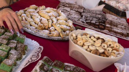 Afternoon party with many sweets and fresh baked cakes