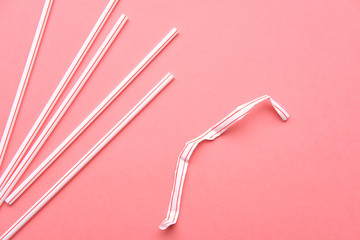 Plastic Drinking Straw Isolated on Pink Background Flat Lay Top View