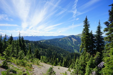Beautiful cloud over snow capped mountains in Olympic National Park in summer in Washington, near Seattle