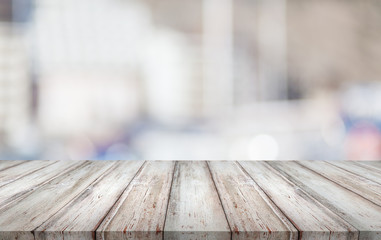 Abstract blur bokeh background with wooden desk