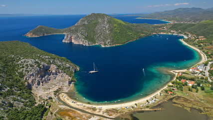 Aerial drone photo of iconic paradise bay and sandy beach of Porto Koufo with turquoise calm sea...