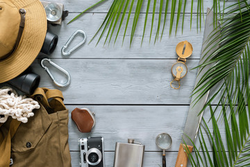 Blank treasure map template on a wooden floor background.