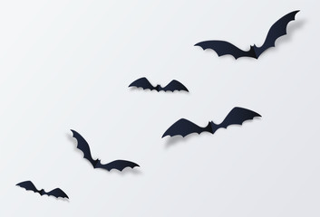 Halloween bat vector decor background. Paper cut style. Black vampire flittermouse flying over white backdrop