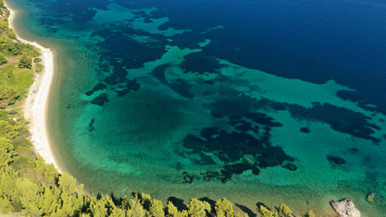 Aerial drone photo of secluded turquoise sandy beaches of South Sithonia peninsula, Halkidiki, North Greece