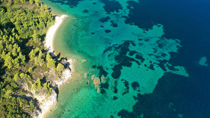 Aerial drone photo of secluded turquoise sandy beaches of South Sithonia peninsula, Halkidiki,...