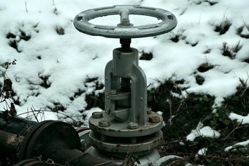 big main valve outside on cold winter day