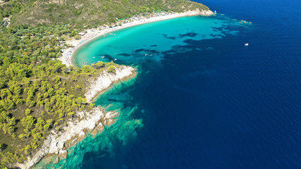 Fototapeta na wymiar Aerial drone photo of secluded turquoise sandy beaches of South Sithonia peninsula, Halkidiki, North Greece