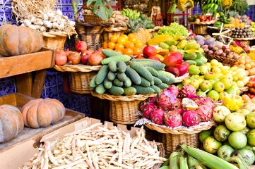 Colored fruits and vegetables in a fruit and vegetable market (Funchal, Madeira, Portugal)